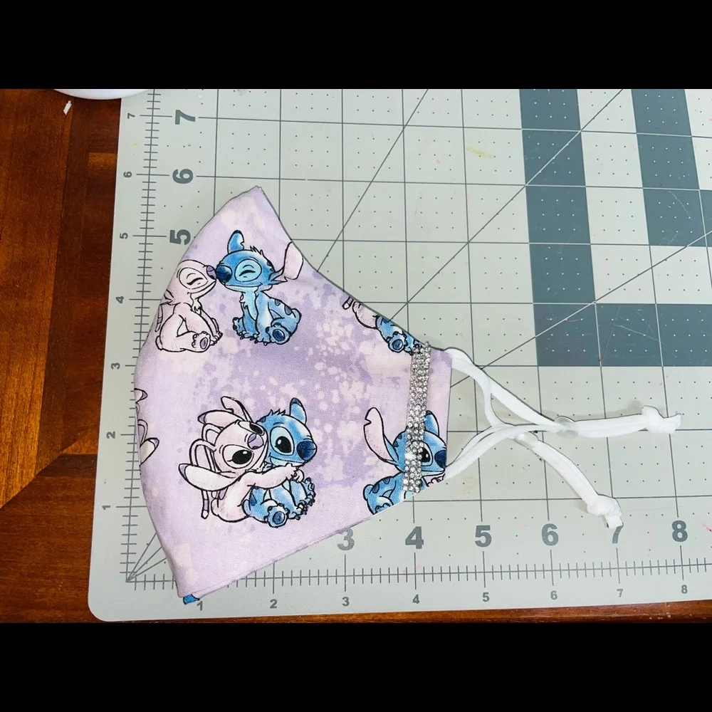 Disney stitch and angel face mask glam